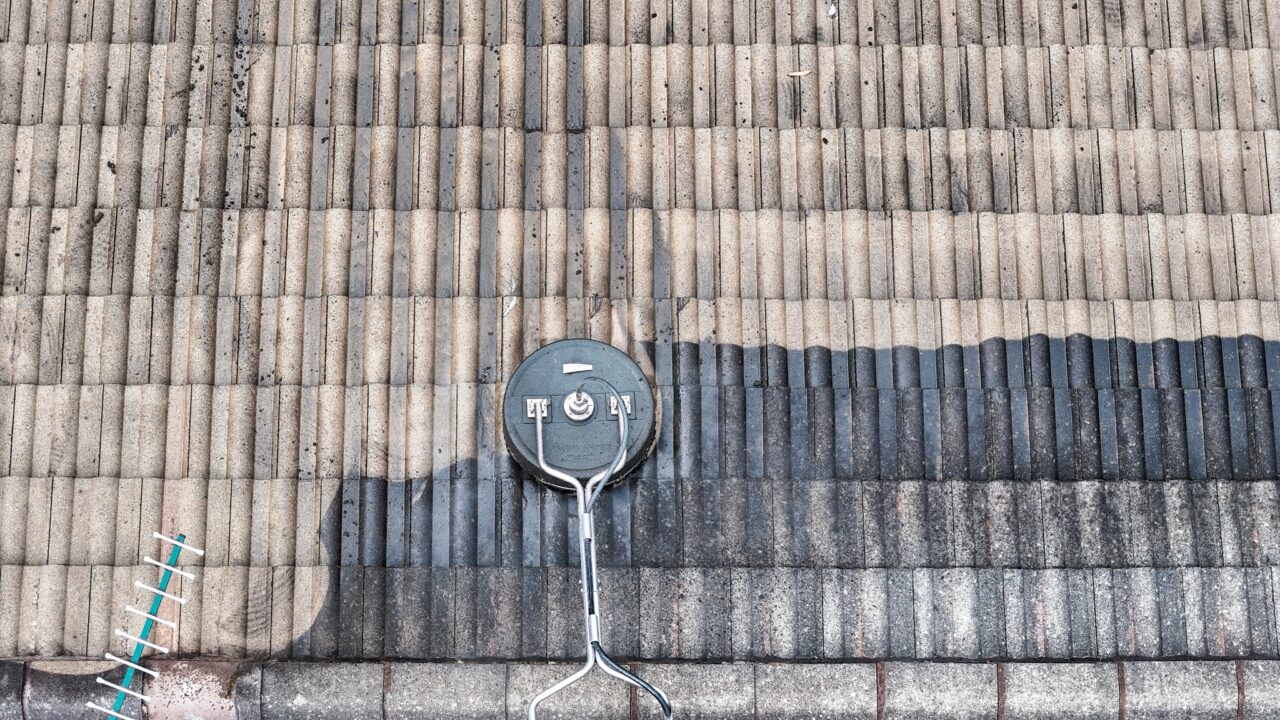 A rooftop in the Blue Mountains showing a clear demarcation of cleaning progress.