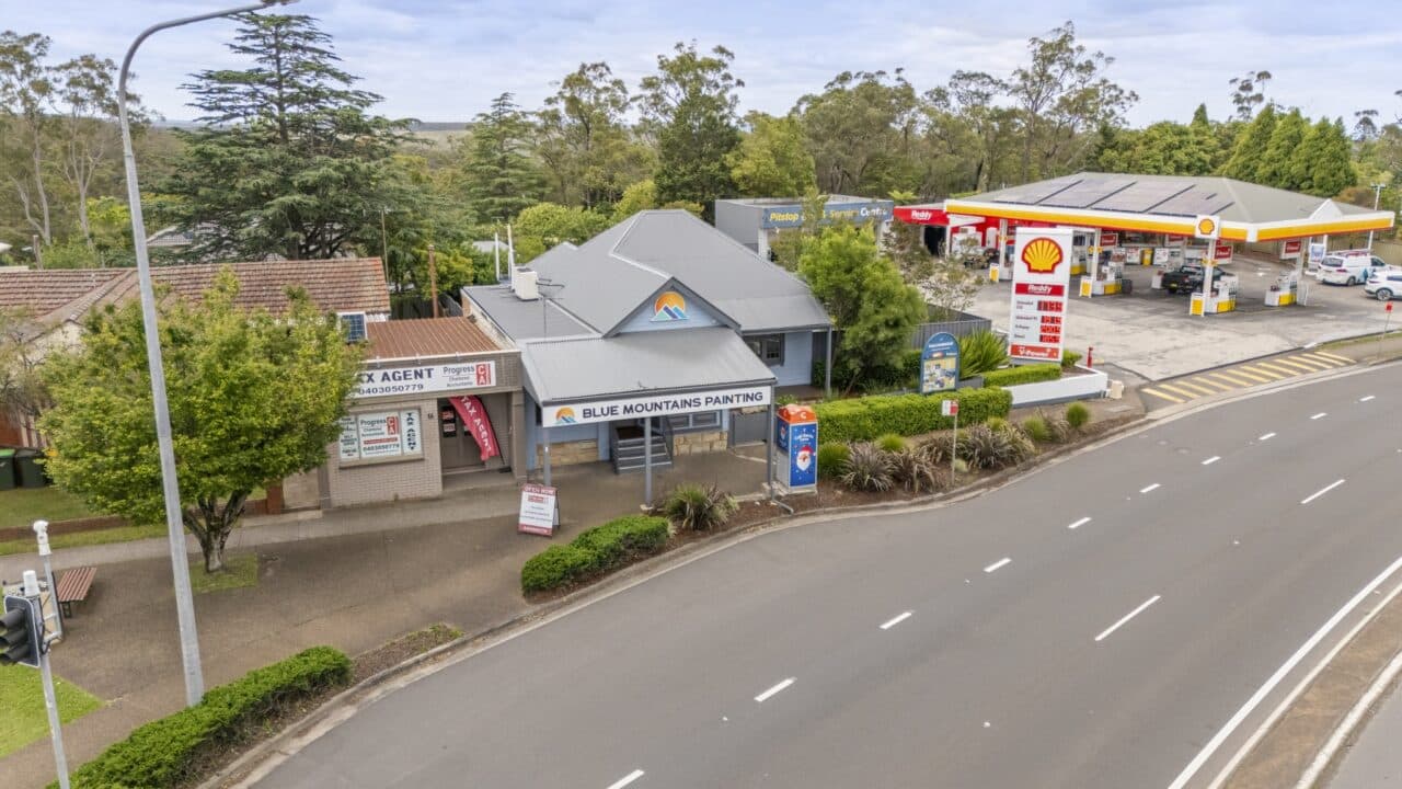 an aerial view captures a street featuring bullaburra house, alongside a painting business