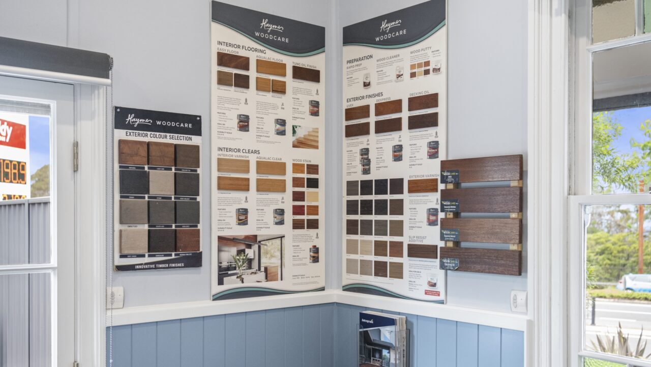 Cozy corner of a showroom showcasing an exquisite array of timber flooring and finishes.