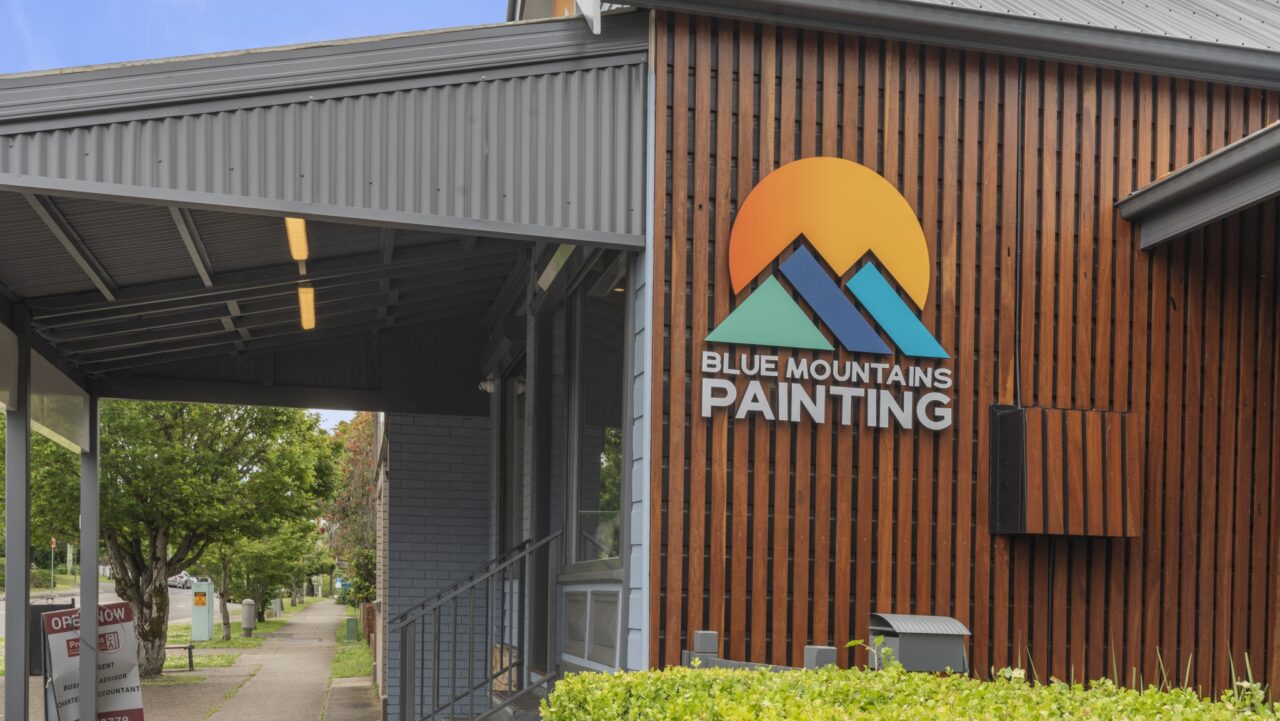 building exterior at bullaburra displaying a sign for "blue mountains painting"